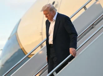 Trump’s Davos trip briefly delayed