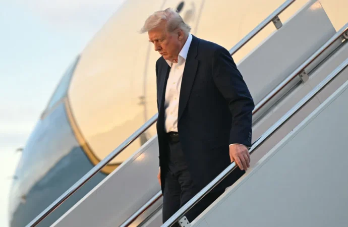 Trump’s Davos trip briefly delayed